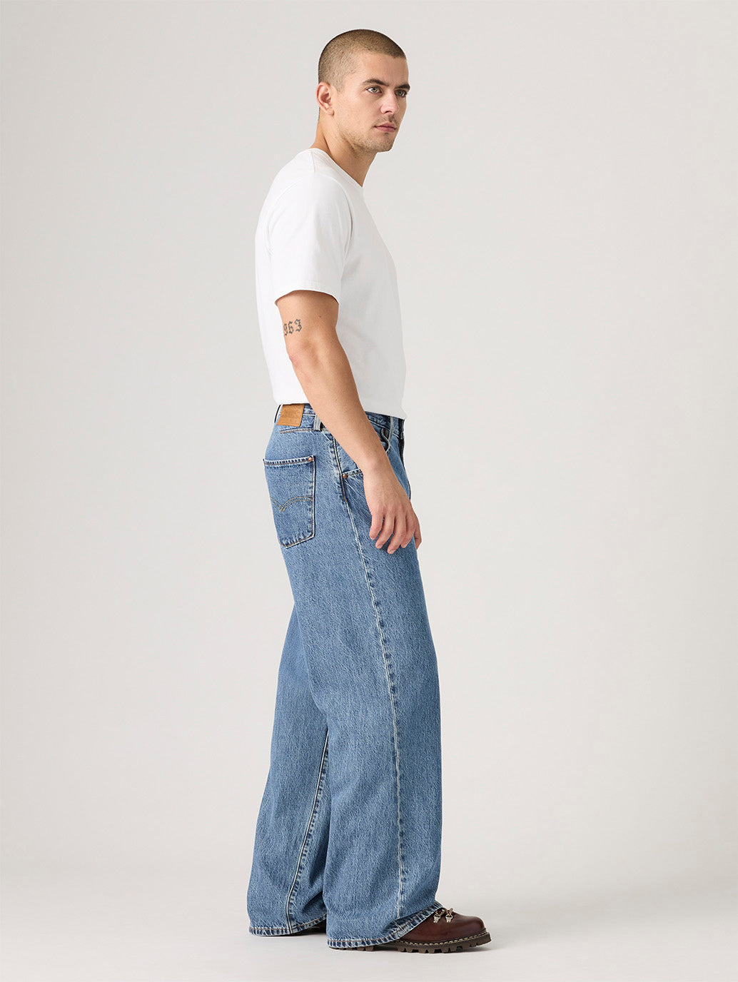 Men's Indigo Twisted Baggy Fit Mid Rise Jeans - Side View