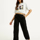 Women's Mid Rise Black Loose Fit Cargo Trousers - Styleshot View