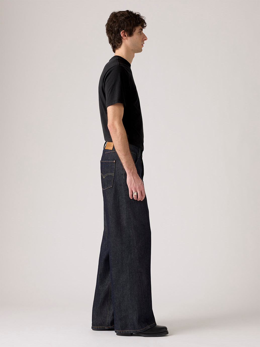 Men's Dark Indigo Twisted Baggy Fit Mid Rise Jeans - Side View