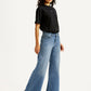 Women's 318 Med Indigo Shaping Wide Leg Fit Mid Rise Jeans - Side View