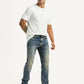 Men's Tinted 513 Med Indigo Slim Tapered Fit Mid Rise Jeans - Styleshot View