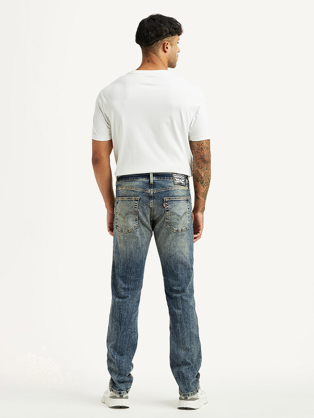 Men's Tinted 513 Med Indigo Slim Tapered Fit Mid Rise Jeans - Back View