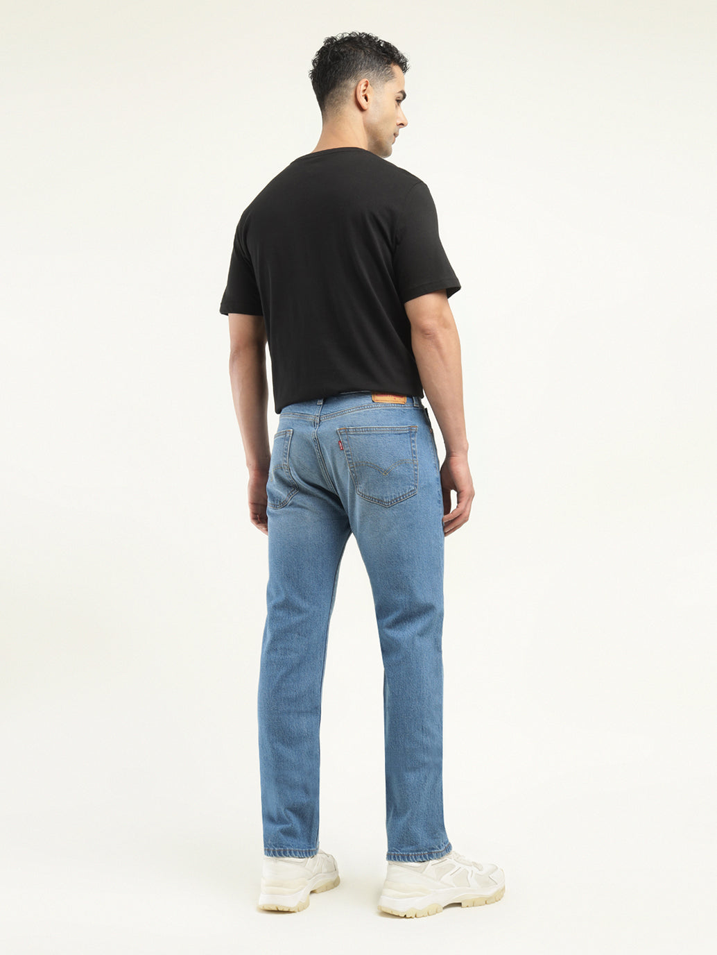 Men's 550 Indigo Loose Fit Mid Rise Jeans - Back View