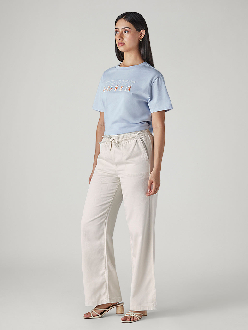 Women's Off White Straight Fit Mid Rise Trousers - Side View
