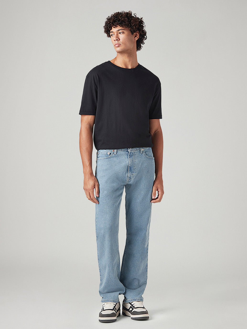 Men's 555 Light Blue Relaxed Straight Fit Mid Rise Tinted Jeans - Front View