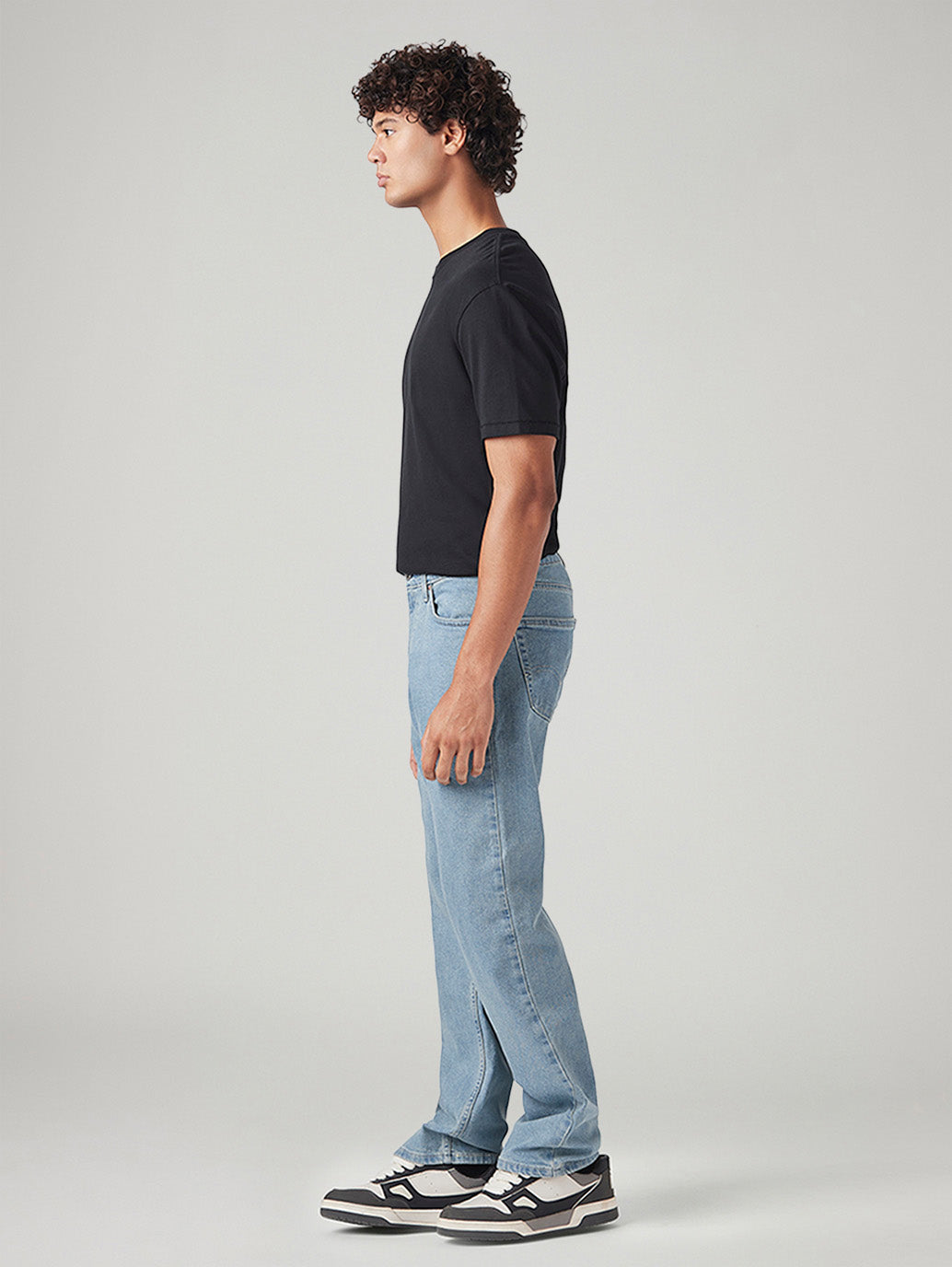 Men's 555 Light Blue Relaxed Straight Fit Mid Rise Tinted Jeans - Side View