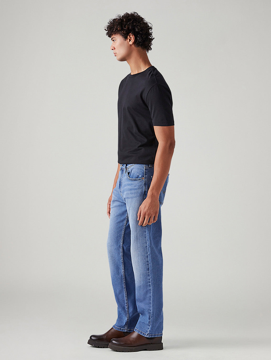 Men's 555 Light Blue Relaxed Straight Fit Mid Rise Jeans - Side View