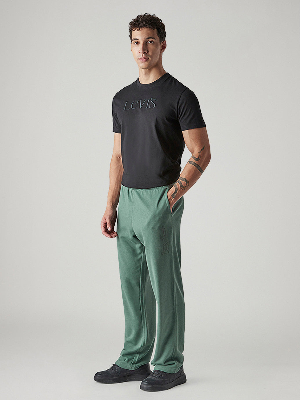 Men's Green Regular Fit Mid Rise Joggers - Side View