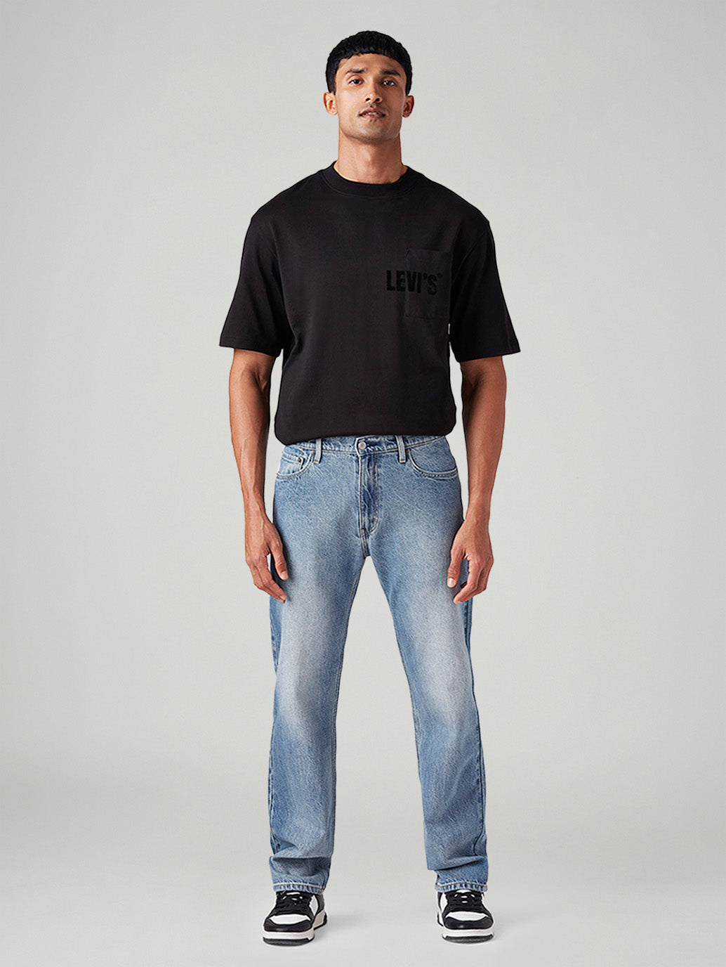Men's 555 Light-Blue Relaxed Straight Fit Mid Rise Jeans - Front View