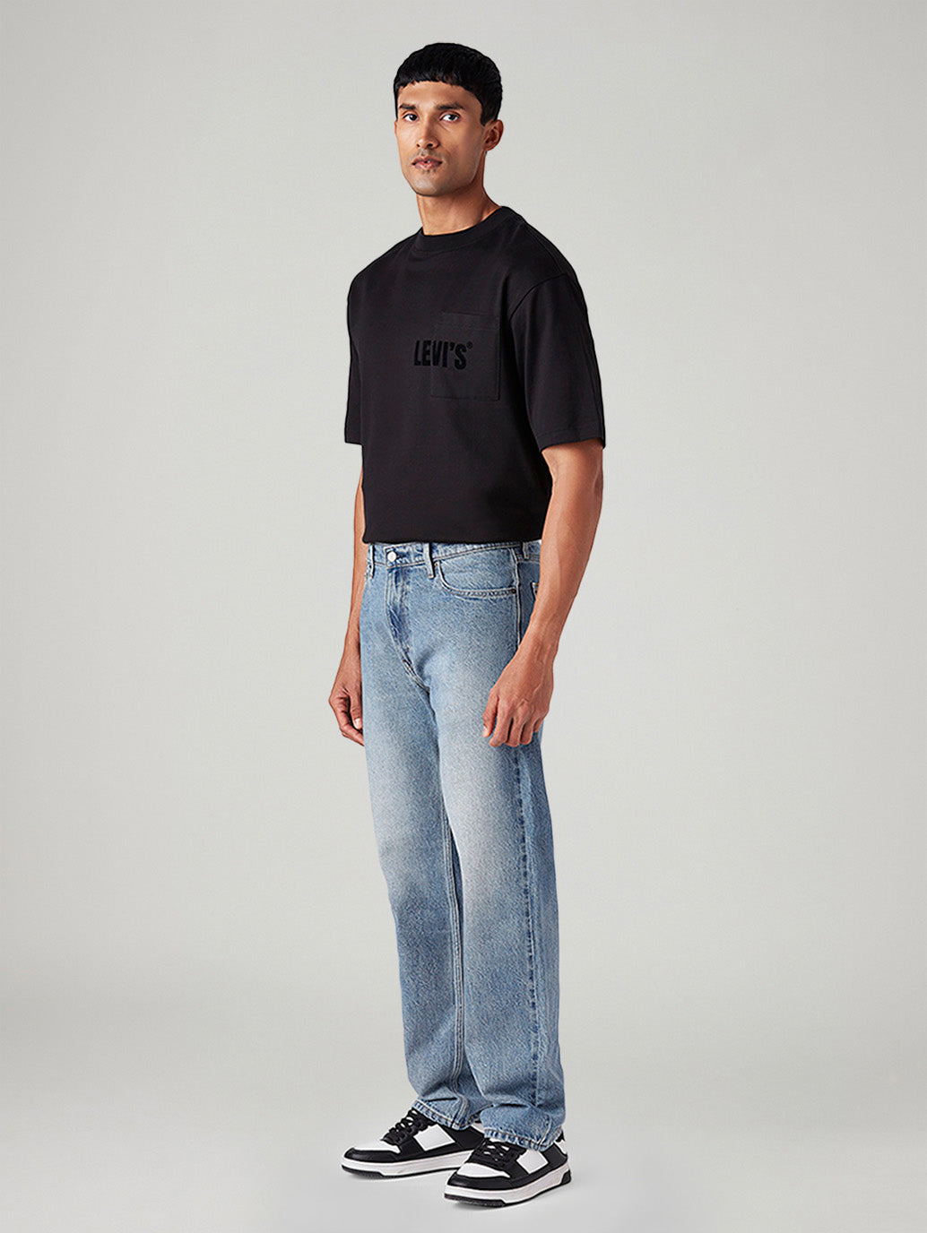 Men's 555 Light-Blue Relaxed Straight Fit Mid Rise Jeans - Side View