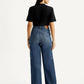 Women's Med Indigo Loose Fit High Rise Jeans - Back View