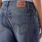 Women's Med Indigo Loose Bootcut Fit Mid Rise Jeans - Detail View