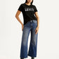 Women's Tinted Blue Loose Bootcut Fit Mid Rise Jeans - Styleshot View