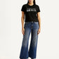 Women's Tinted Blue Loose Bootcut Fit Mid Rise Jeans - Front View