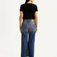 Women's Tinted Blue Loose Bootcut Fit Mid Rise Jeans - Back View