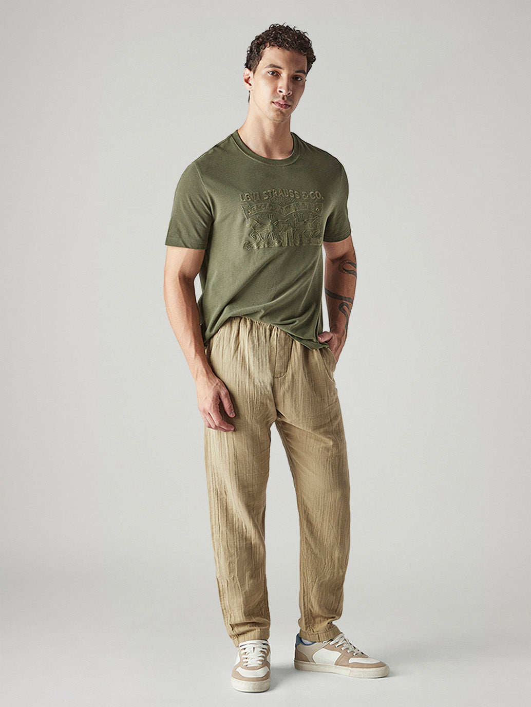 Men's Khaki Tapered Fit Mid Rise Pull On Chinos