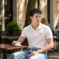 Men's Solid White Slim Fit Pique Polo T-shirt - Lifestyle View