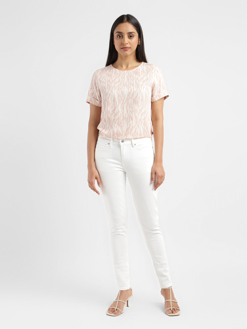 Women's 711 White Skinny Fit Mid Rise Jeans - ModelFront View