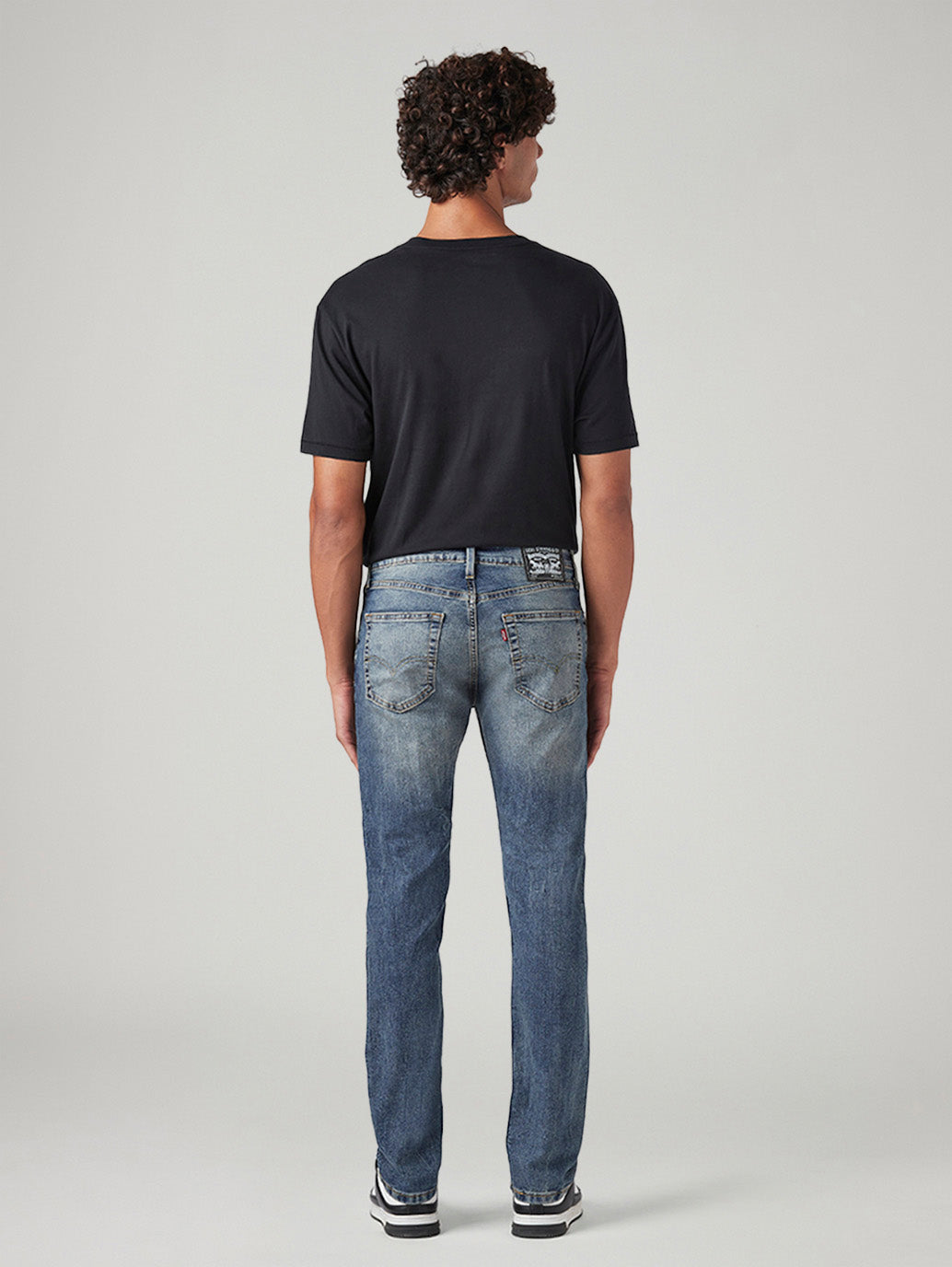 Men's 511 Blue Slim Fit Mid Rise Tinted Jeans - Back View