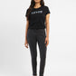 Women's 710 Black Skinny Fit Mid Rise Jeans - ModelFront View