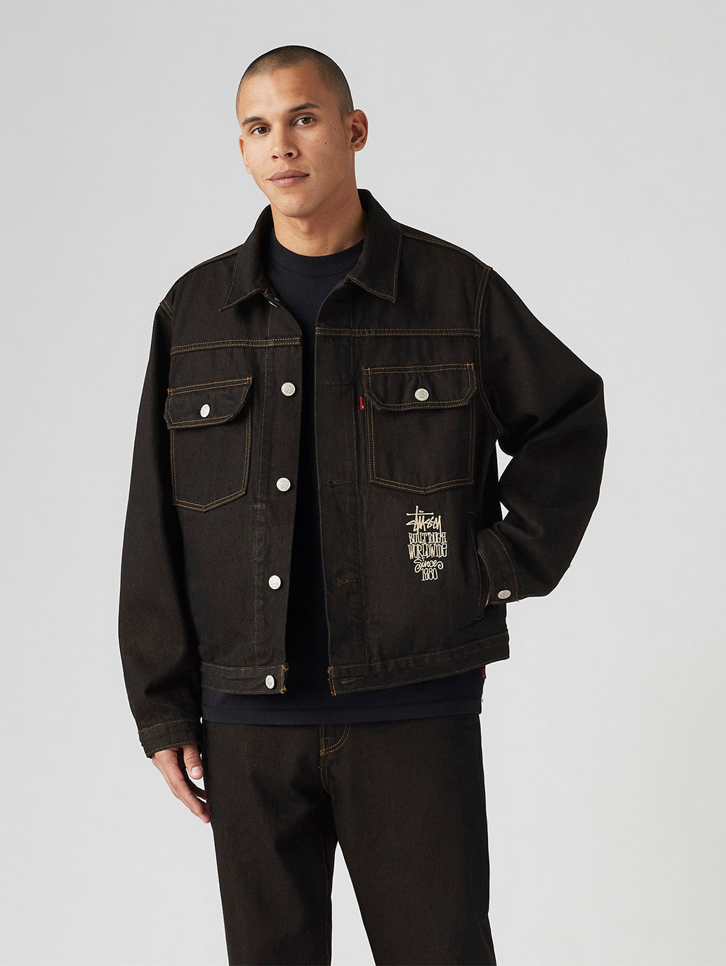 Stüssy & Levi’s® Crispy Rinse Trucker Jacket - 0a9584db-d0f3-489f-98ab-0d92fa21bebc View